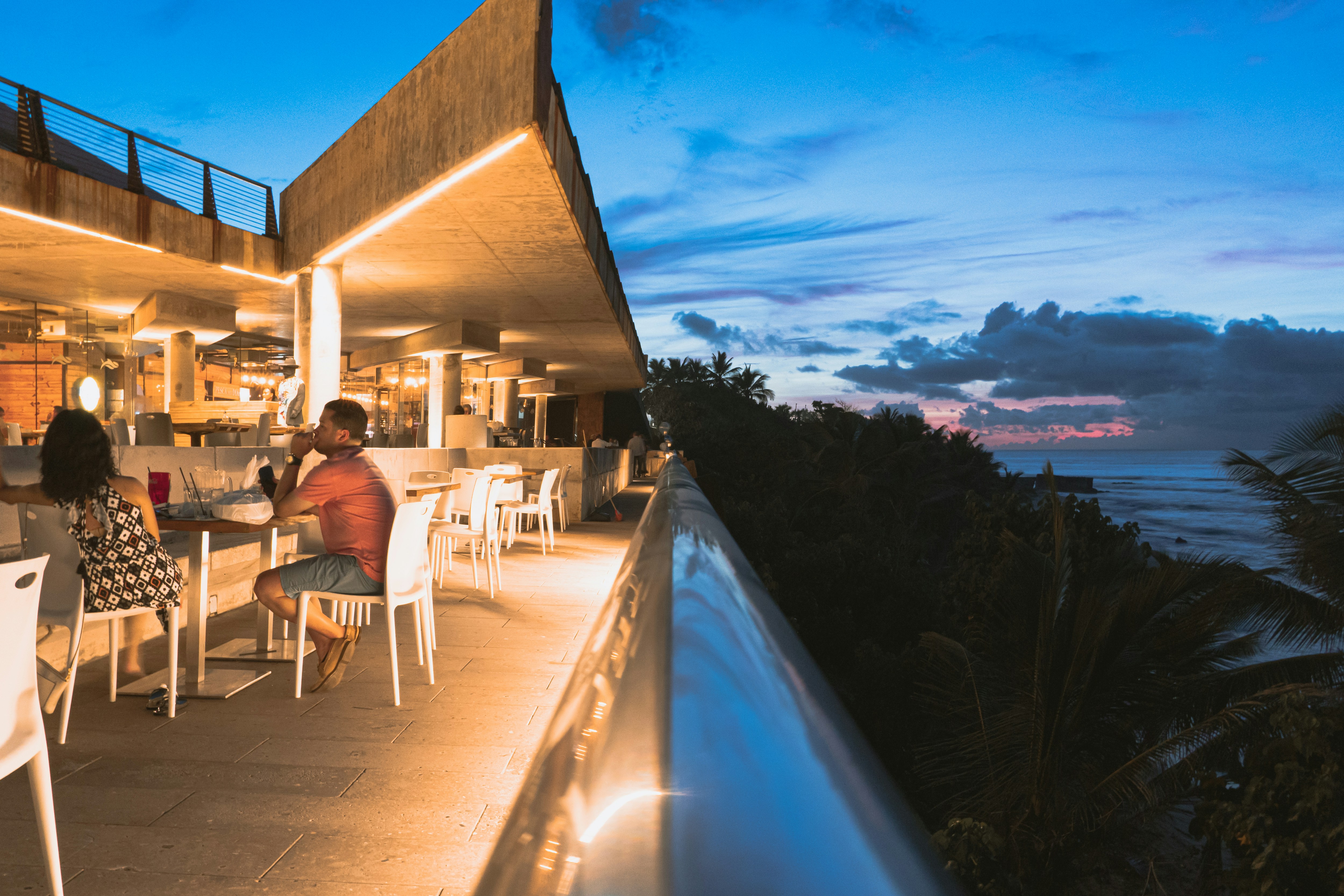 Sunset rooftop bar overlooking the ocean in Playa del Carmen